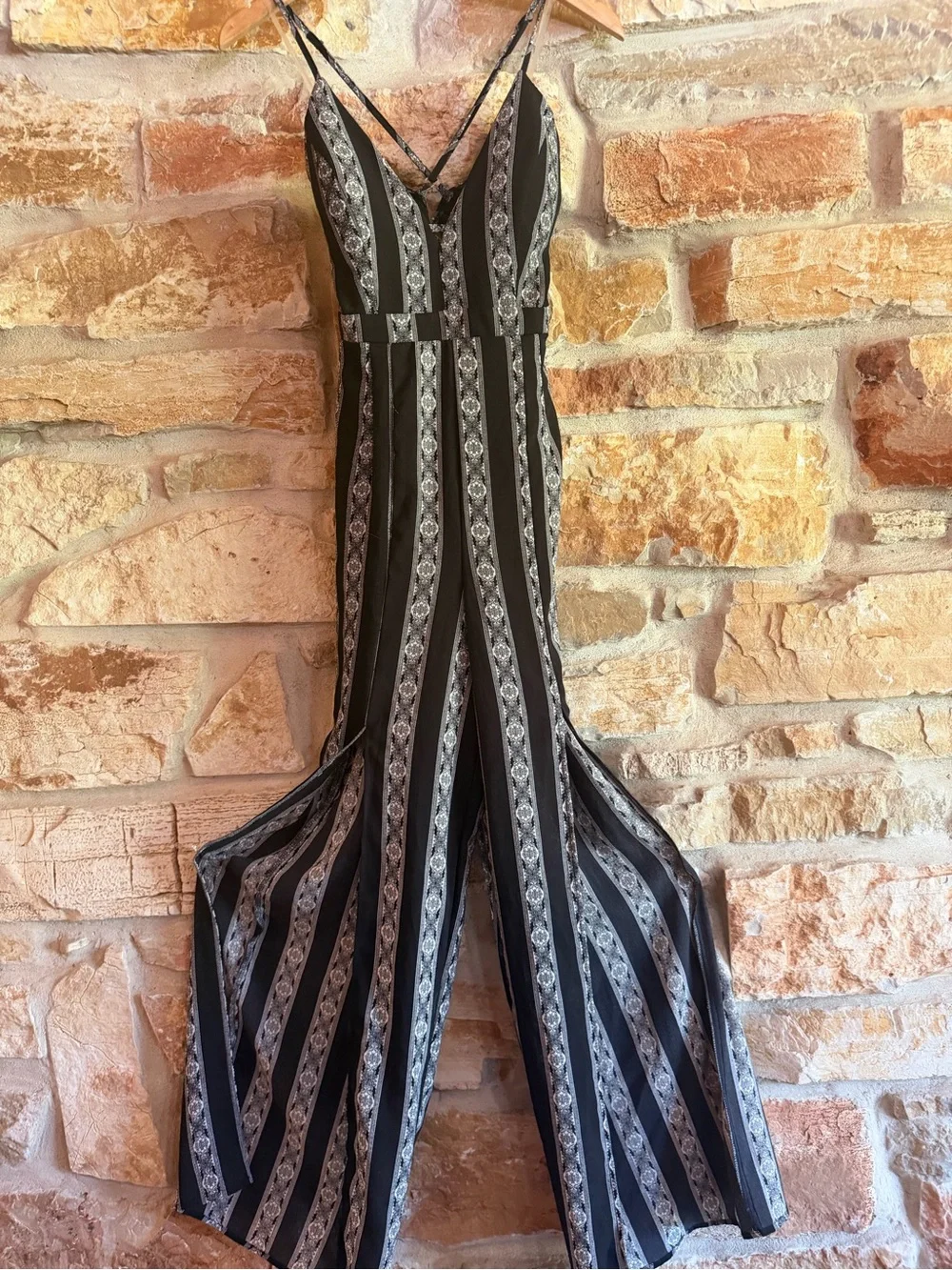 Black & White Striped V‑Neck Spaghetti‑Strap Jumpsuit
